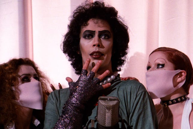 Image from 'The Rocky Horror Picture Show', Frank-N-Furter is gasping