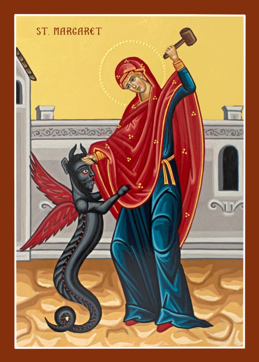 Icon of St. Margaret of Antioch (Margaret) - English Inscription at top of icon - Margaret is featured wearing a crimson robe over dark blue garments. In one hand she is holding a black devil down, while another hand holds a hammer poised over her head. Icon of St. Margaret of Antioch (Margaret) - English Inscription at top of icon - Margaret is featured wearing a crimson robe over dark blue garments. In one hand she is holding a black devil down, while another hand holds a hammer poised over her head.