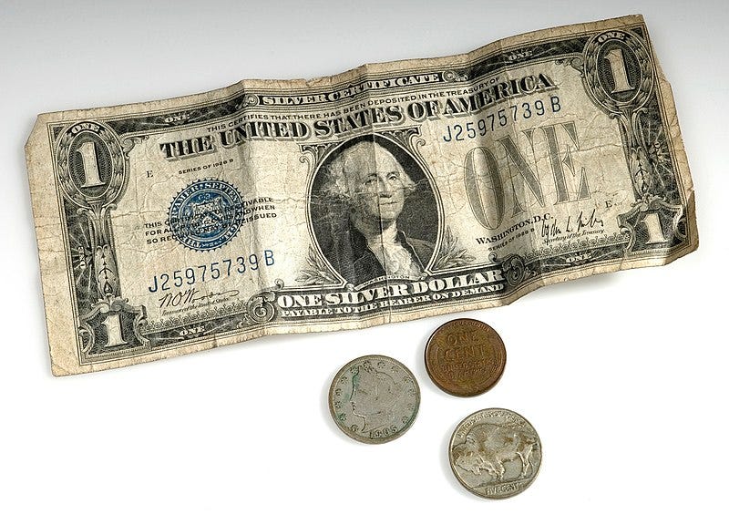 File:Dollar bill and small change.jpg