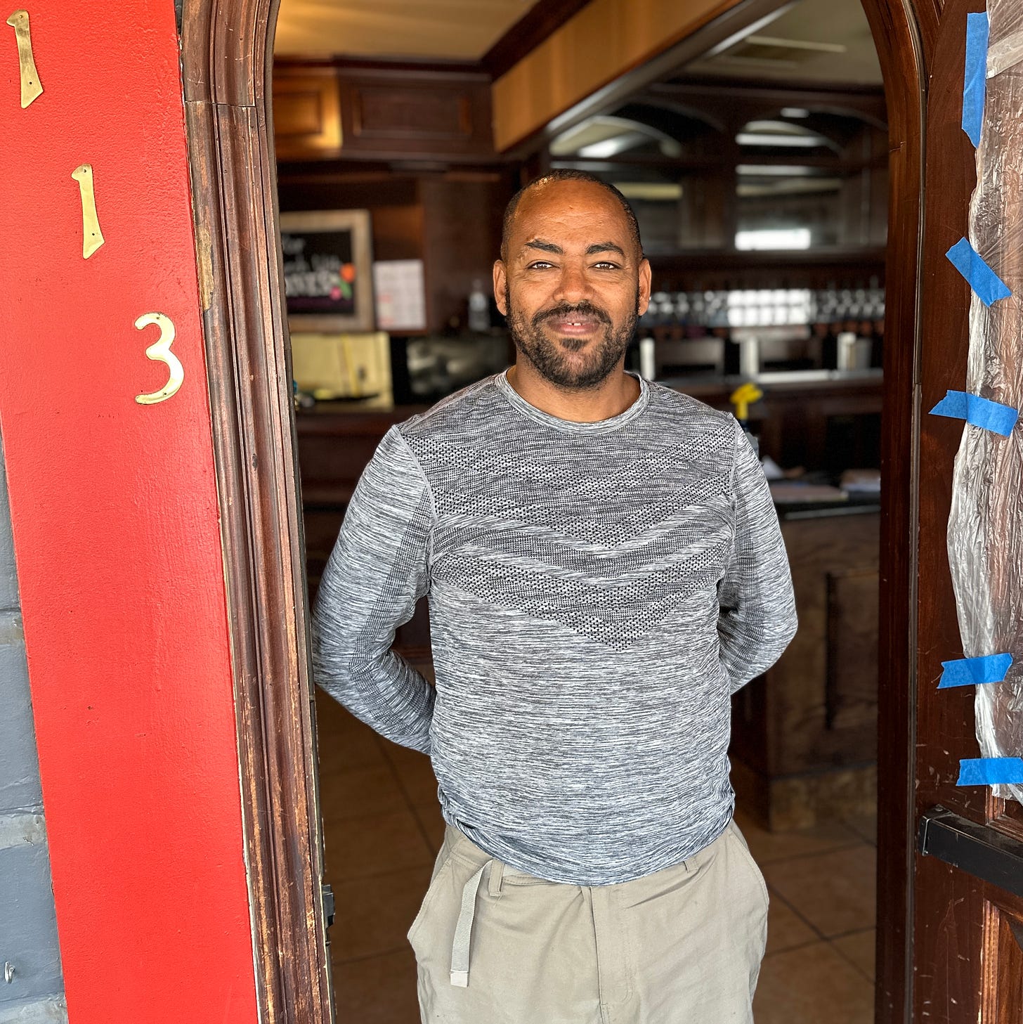 Wondimagegn Shewa is one of two owners of Taffach Ethiopian Restaurant, coming to the former Bones Craft Kitchen spot at 113 D St. (Photo by Wendy Weitzel)