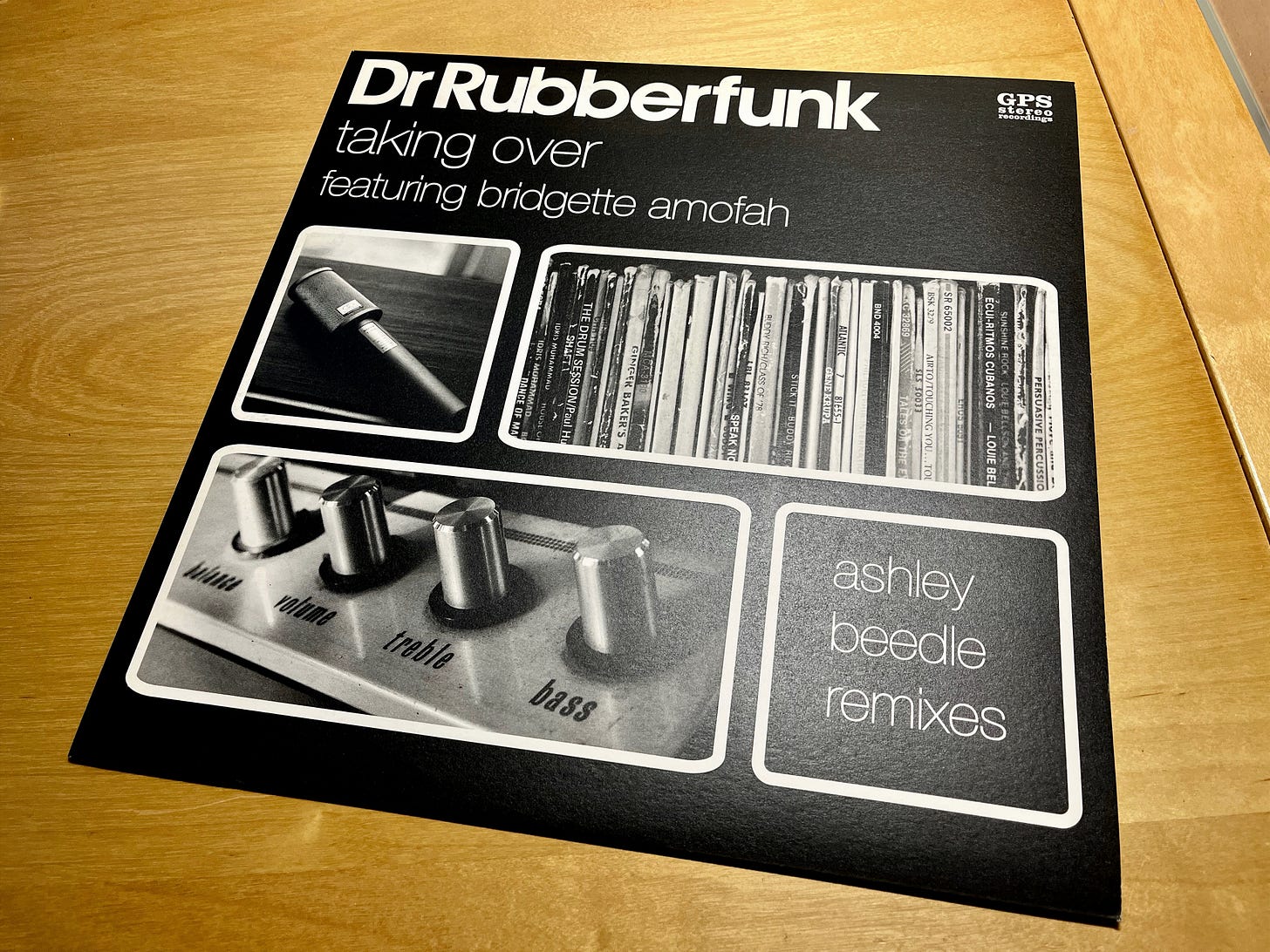 Photo of 12" vinyl cover of 'Taking Over' by Dr Rubberfunk, featuring Bridgette Amofah and remixed by Ashley Beedle.