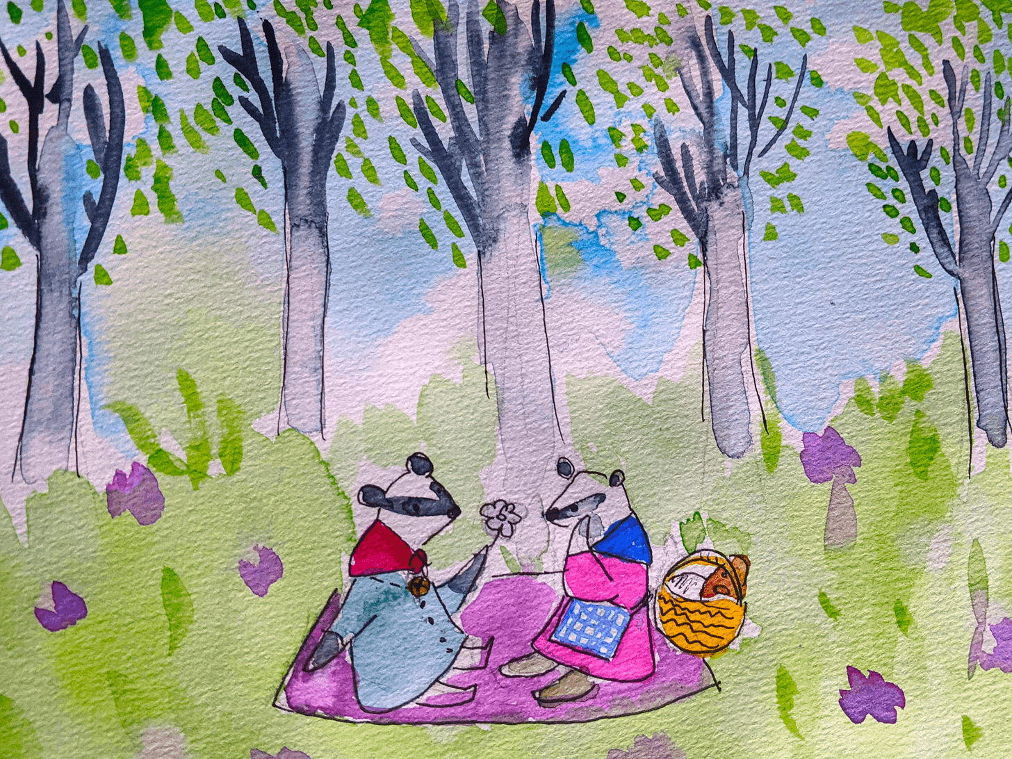 Two young badgers having a picnic in a spring woodland clearing.
