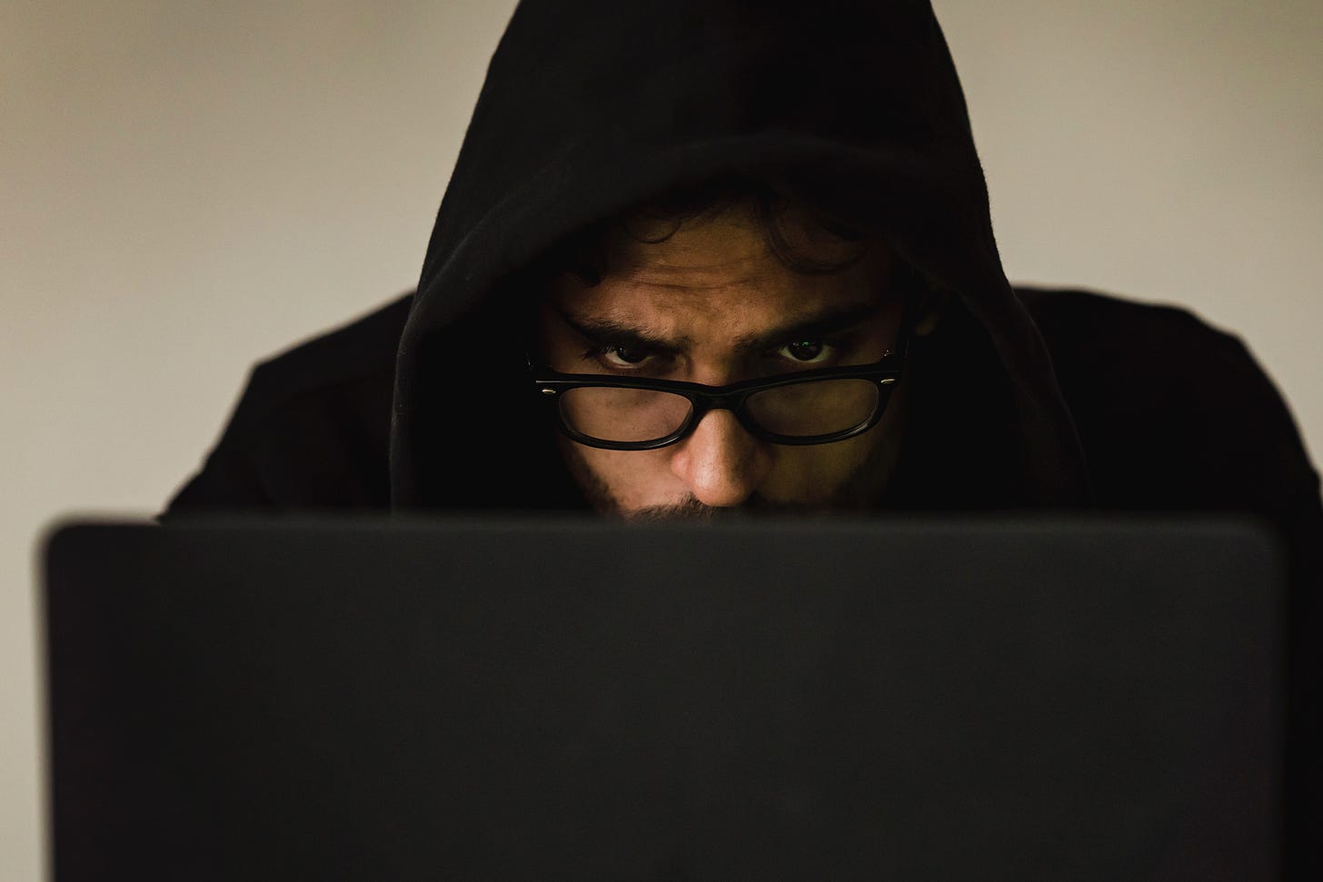 hacker stealing data and sending malware