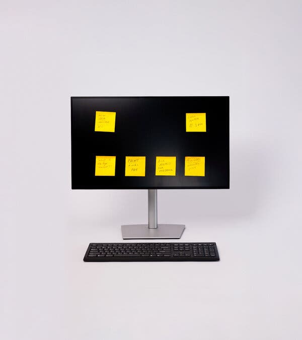 A photo illustration shows a computer with Post-it notes on the monitor in the shape of a face.