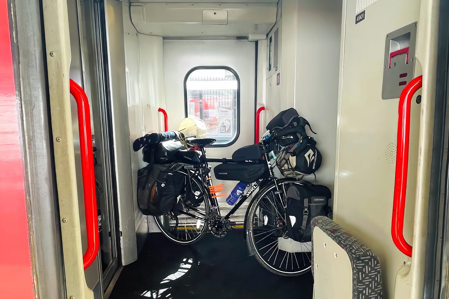 Curly the Surly, Ghandi's bike, packed up and loaded onto the train, ready for the upcoming adventure.