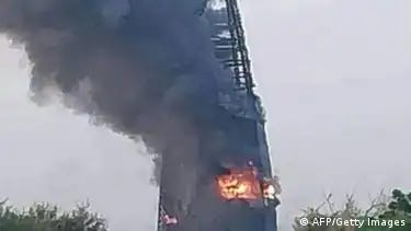 The iconic 18-story building caught fire early Sunday morning
