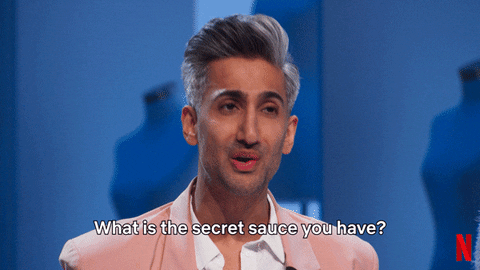 A gif of Tan France as a judge on Next in Fashion asking, "What is the secret sauce you have?"