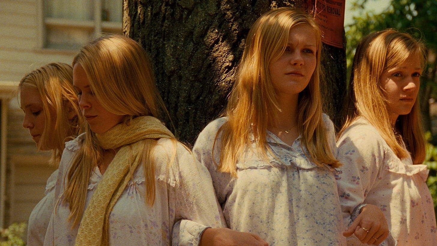 The Lisbon sisters lock arms around the diseased elm.