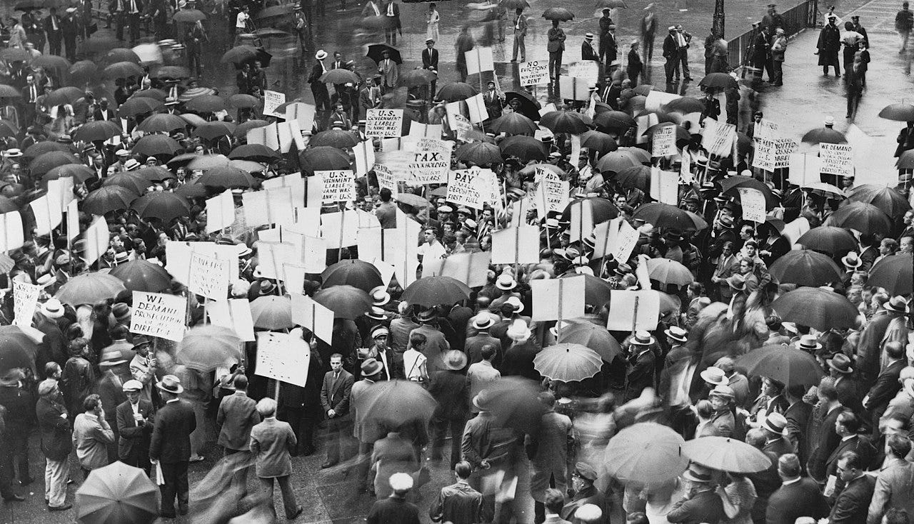 Crowds gather outside the Bank of the United States after its failure.