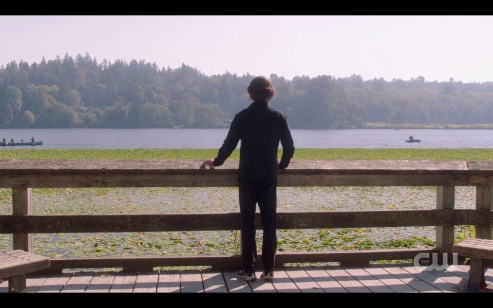 Sam Winchester running looking at lake SPN