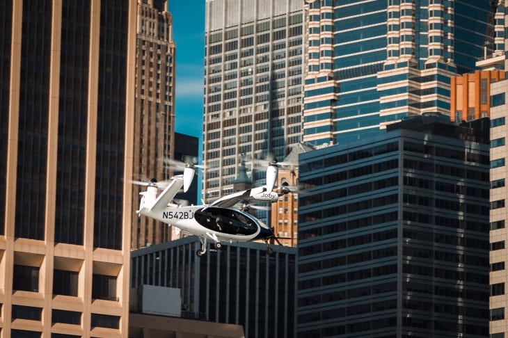 Joby air taxi flying over NYC