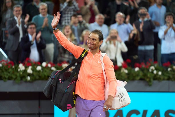Rafael Nadal of Spain waves goodbye to the Spanish fans after defeat in his last professional match in Spain against Jiri Lehecka of the Czech...