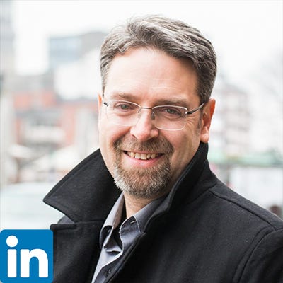 Chris Corrigan's LinkedIn profile picture.