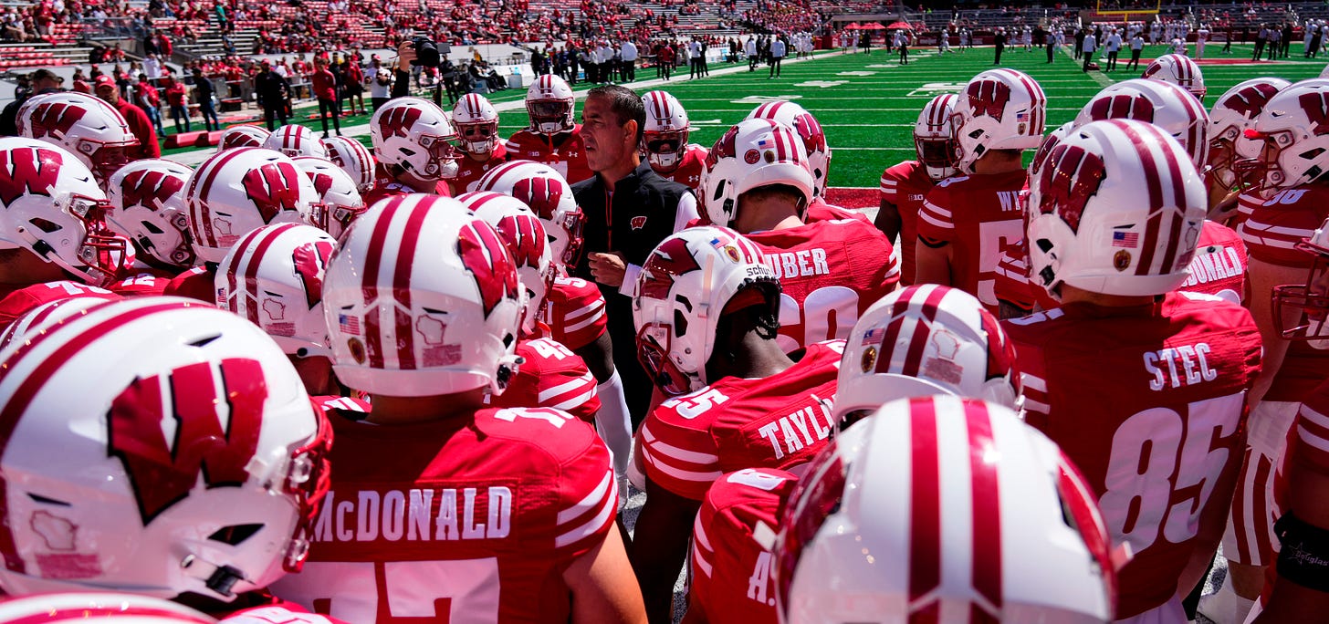 Wisconsin Badgers head coach Luke Fickell addresses the team before a game at Camp Randall Stadium