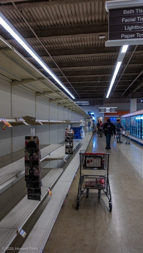 shows the empty paper goods aisle