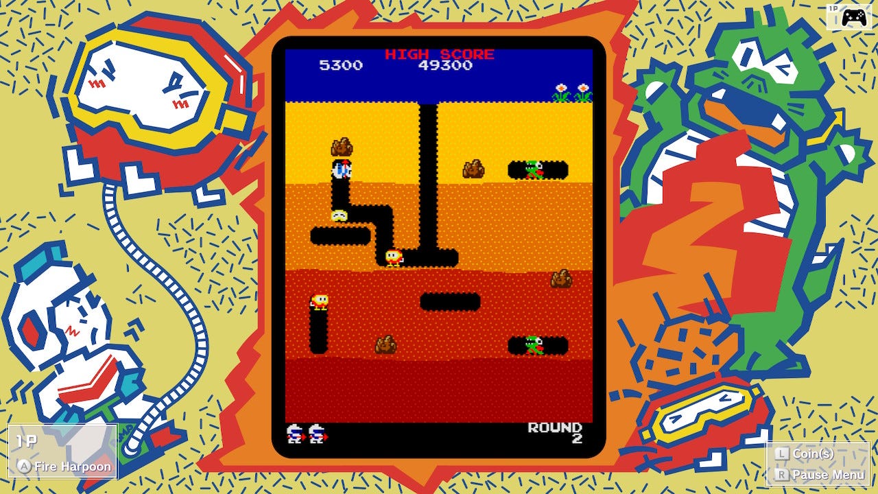 A screenshot from the Namco Museum Switch edition of Dig Dug. A Pooka is floating from a cavern below into the one made by the player, who is camped under a rock waiting for the floating Pooka to be in a position it can't escape.