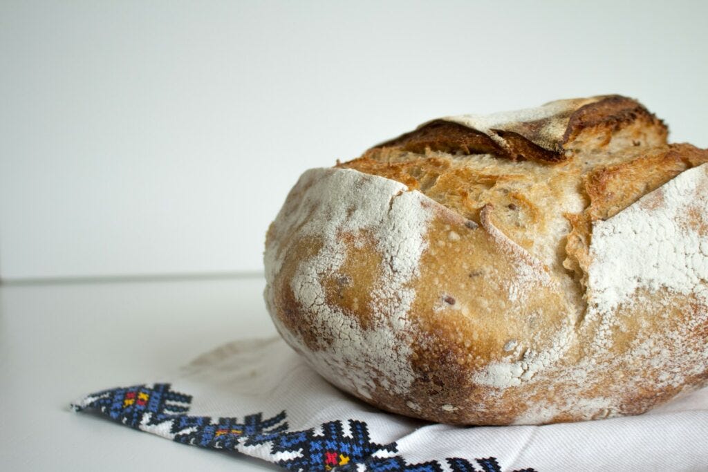 bread on white and blue floral textile