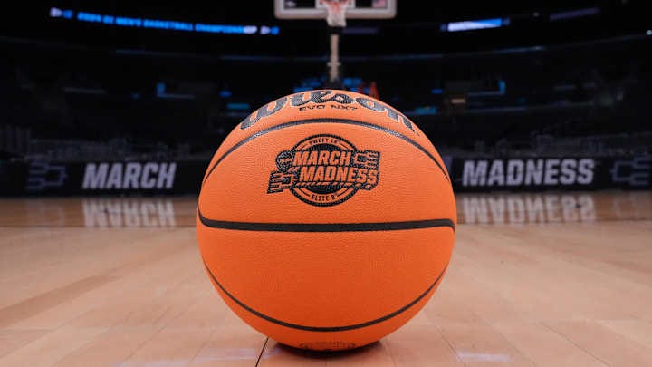 A Wilson official Evo NXT game basketball with March Madness logo