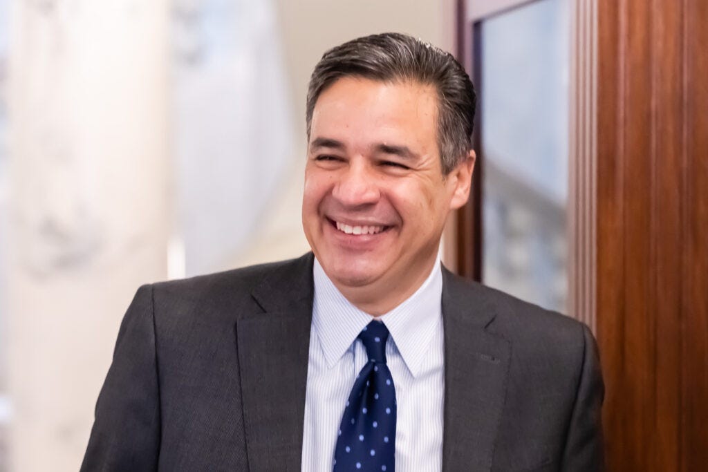 Picture of Idaho Attorney General Raúl R. Labrador smiling in the Capitol building a few days after being sworn in