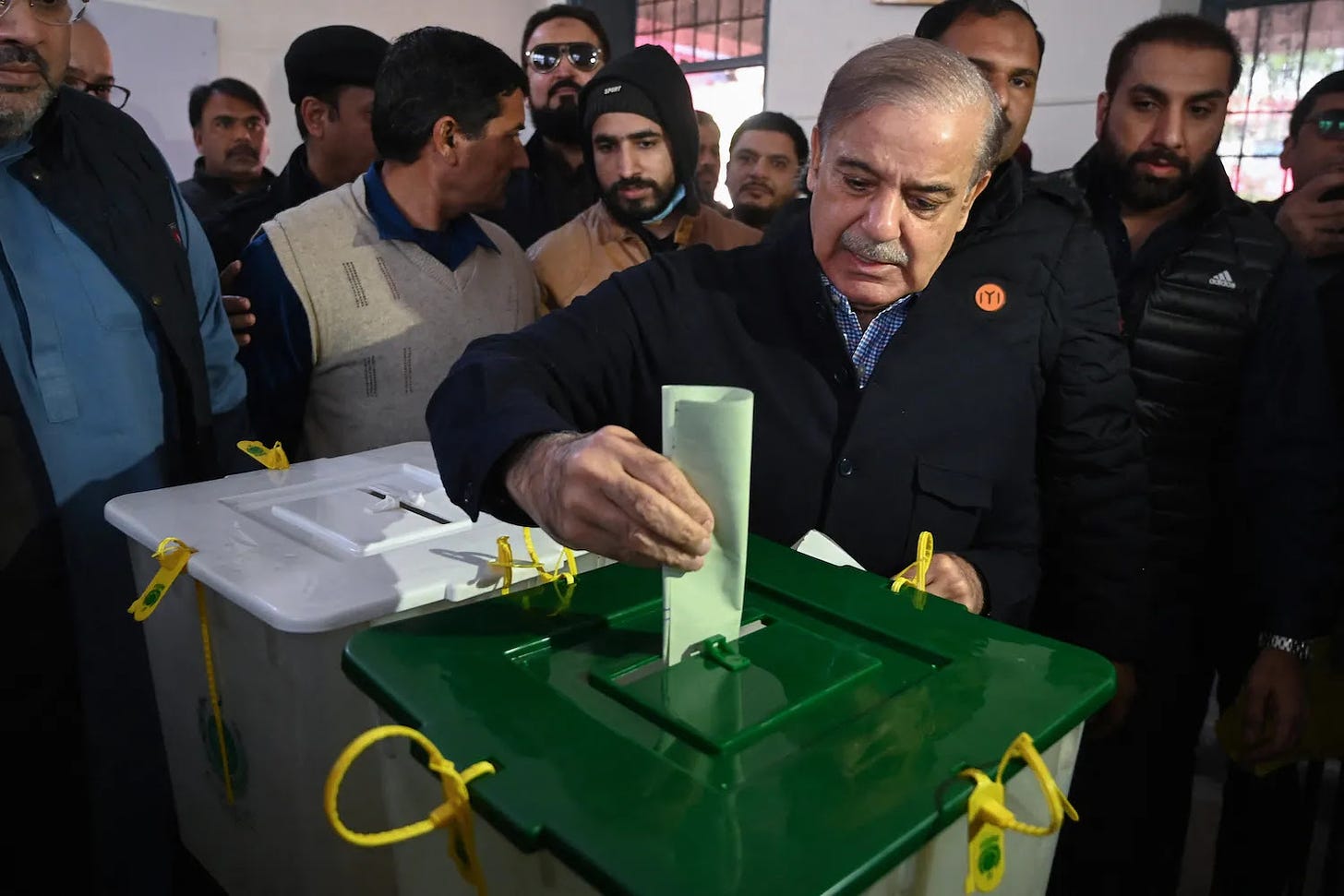 Former Pakistani Prime Minister Shehbaz Sharif casts his ballot.