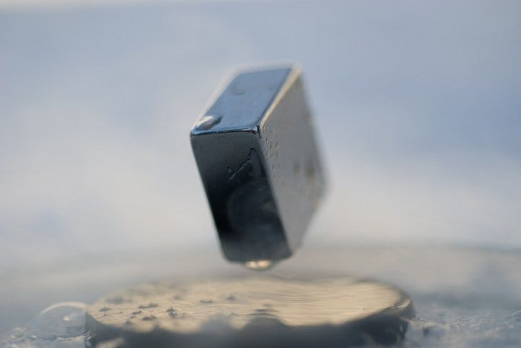Magnet levitating atop a superconductor