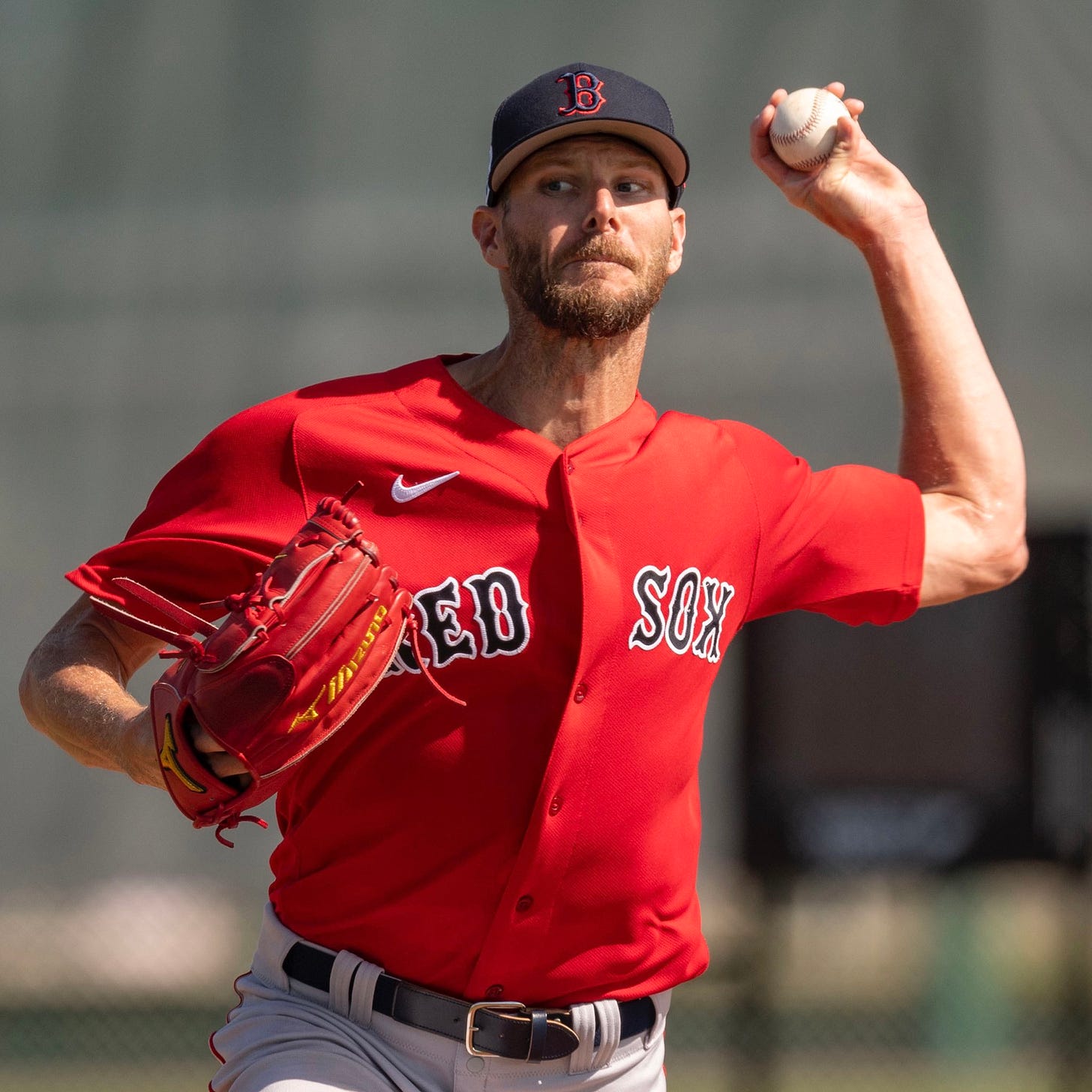 Chris Sale throws on the mound in the backfields during a live BP at Spring Training.