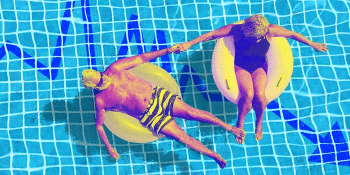 Senior couple enjoying a relaxing float in a pool with a downward trending stock line depicted at the bottom of the pool