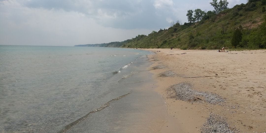 May be an image of horizon, body of water and beach