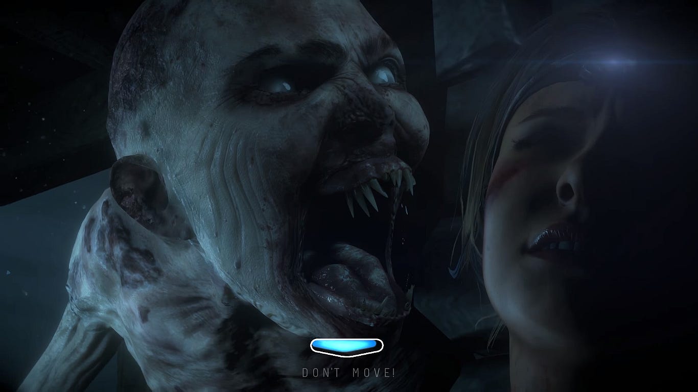 A screenshot of Sam holding still will being hunted by a w*ndigo in Until Dawn. The prompt at the bottom of the image says DONT MOVE.