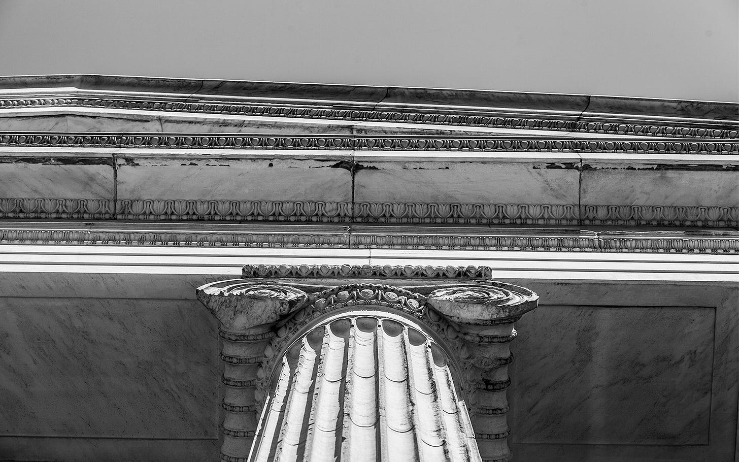 Column proudly supporting a roof unaware of the age of the building