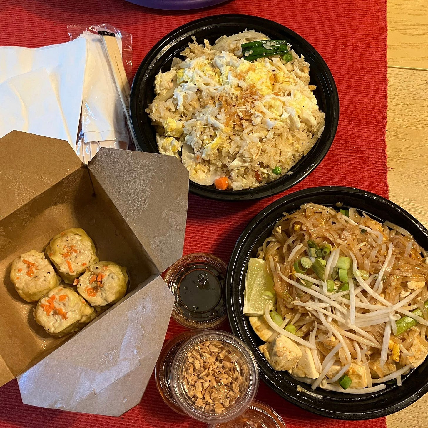 May be an image of chow mein, fried rice and noodles