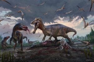 A snapshot of life 135 million years ago in Early Cretaceous England: A spinosaur (center) claims an ornithopod carcass, while smaller tyrannosaurs (left) and dromaeosaurids (bottom right) look on in frustration. Credit: Anthony Hutchings.