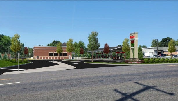 Rendering of a planned new Wawa convenience store with fuel pumps, as seen from Sumneytown Pike in Upper Gwynedd, as presented during the Nov. 21, 2023 township commissioners meeting. (Image provided by Wawa developer)