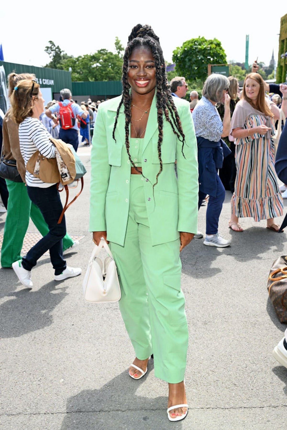 Clara Amfo in a matching green suit set.