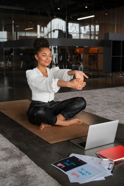 Full shot woman stretching at work