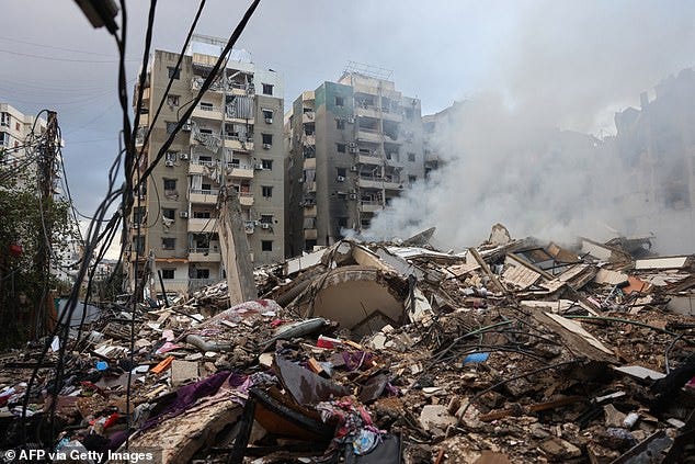 A picture shows a view of the destruction at the site of an overnight Israeli airstrike on the Laylaki neighbourhood in Beirut's southern suburbs on October 1, 2024