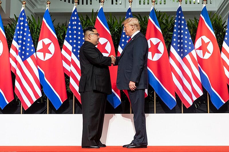 File:Kim and Trump shaking hands at the red carpet during the DPRK–USA Singapore Summit.jpg