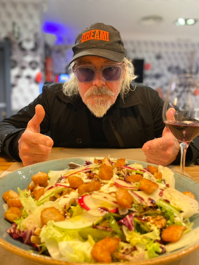 Simon staring at Starlite's chicken salad.