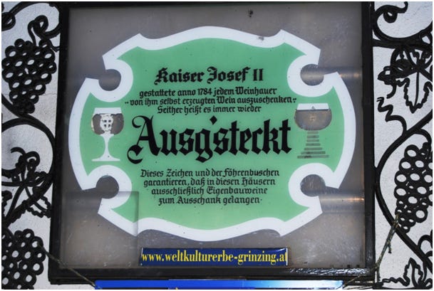 Ausg'steckt sign in Vienna.