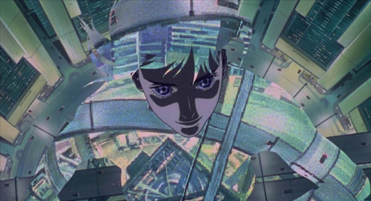 Movie still from Ghost in the Shell. A woman with a cityscape superimposed on her