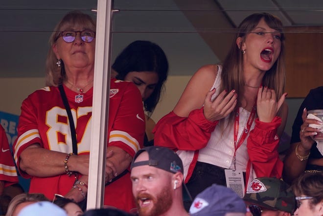 Taylor Swift watches from a suite alongside Travis Kelce's mother, Donna Kelce, inside Arrowhead Stadium during the first half of an NFL football game between the Chicago Bears and the Kansas City Chiefs on Sunday, Sept. 24, 2023, in Kansas City, Mo.