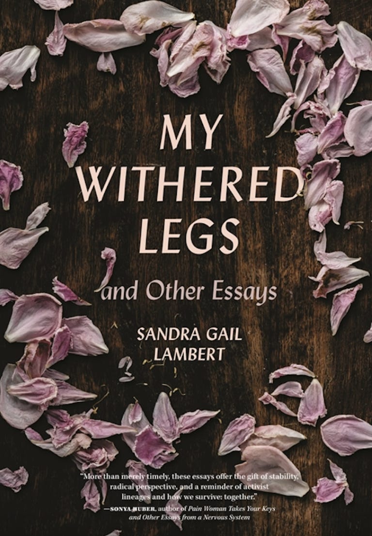 My Withered Legs and Other Essays, Sandra Gail Lambert, with a wood tabletop and flower petals strewn on it
