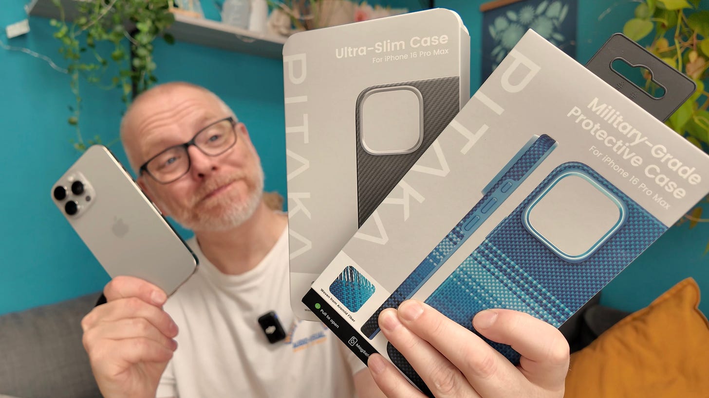 The author is holding an iPhone 16 Pro Max in one hand and in the other 2 iPhone cases from Pitaka