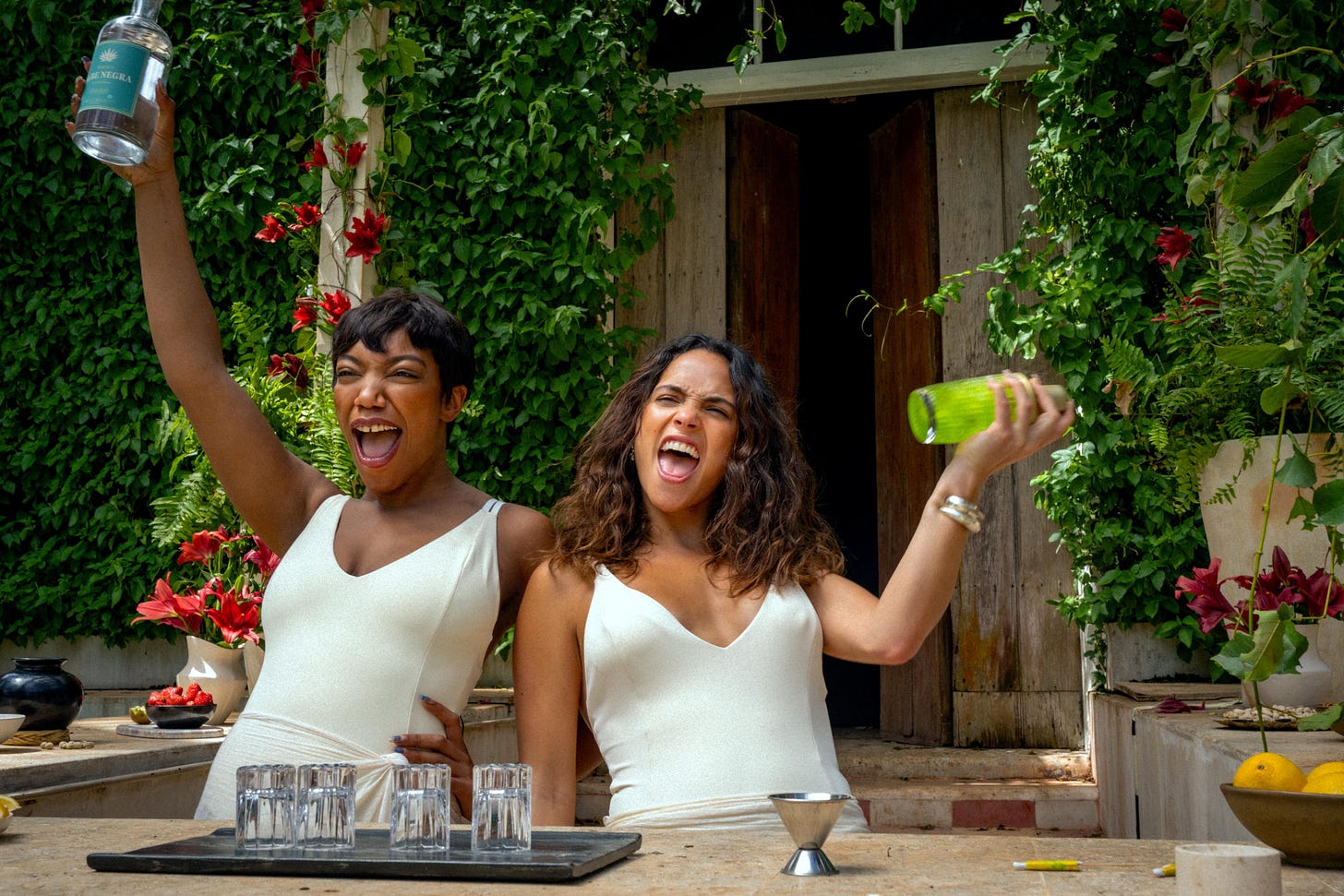 Naomi Ackie and Adria Arjona partying it up in "Blink Twice" (2024)