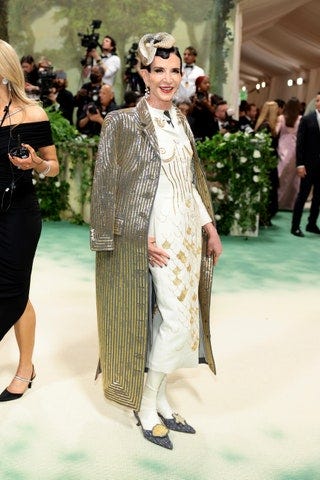 Image may contain Person Adult Clothing Footwear High Heel Shoe Wedding Accessories Jewelry Ring Bracelet and Hat Image may contain Person Adult Clothing Footwear High Heel Shoe Wedding Accessories Jewelry Ring Bracelet and Hat