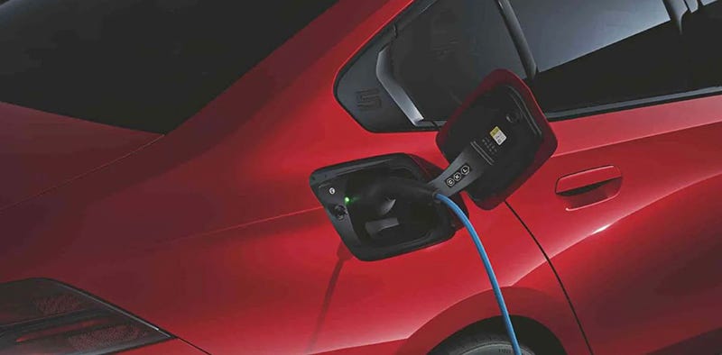 Photo of an EV plugged in to charge