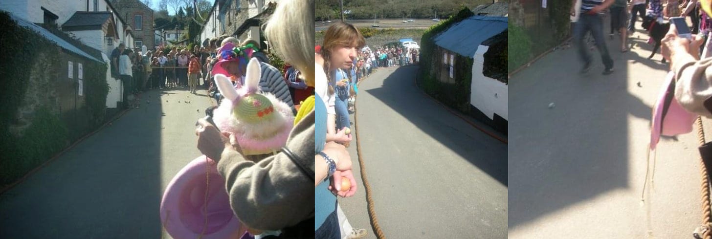 rolling easter eggs down a street in a village