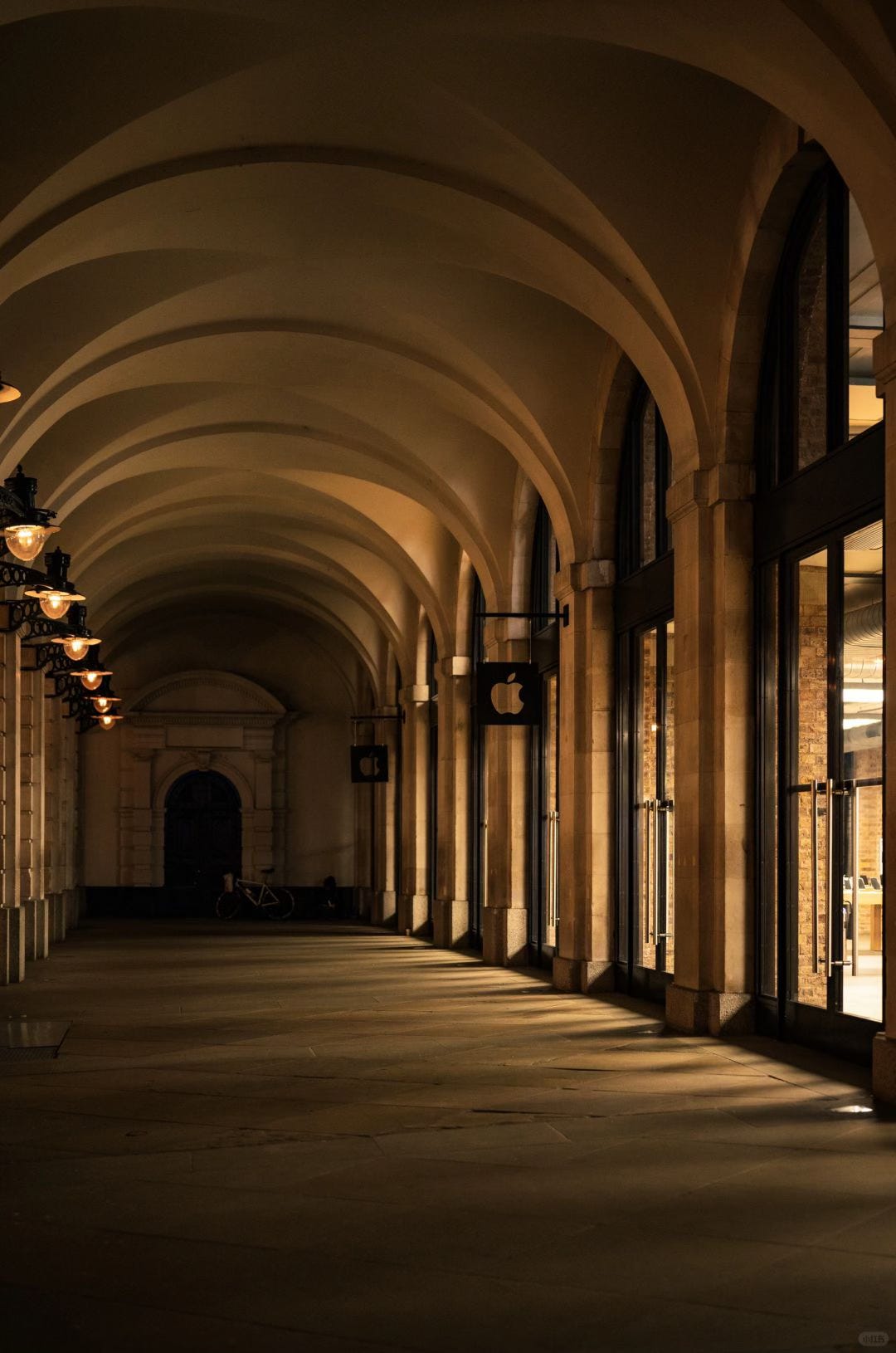 The exterior of Apple Covent Garden with low, ambient evening light.