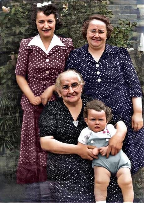 Bobby Zimmerman, who would become Bob Dylan, sits on the lap of his  great-grandmother, Lybba Edelstein, in this photo taken in 1942. Bobby's  mother, Beatty Stone Zimmerman, stands at left, next to