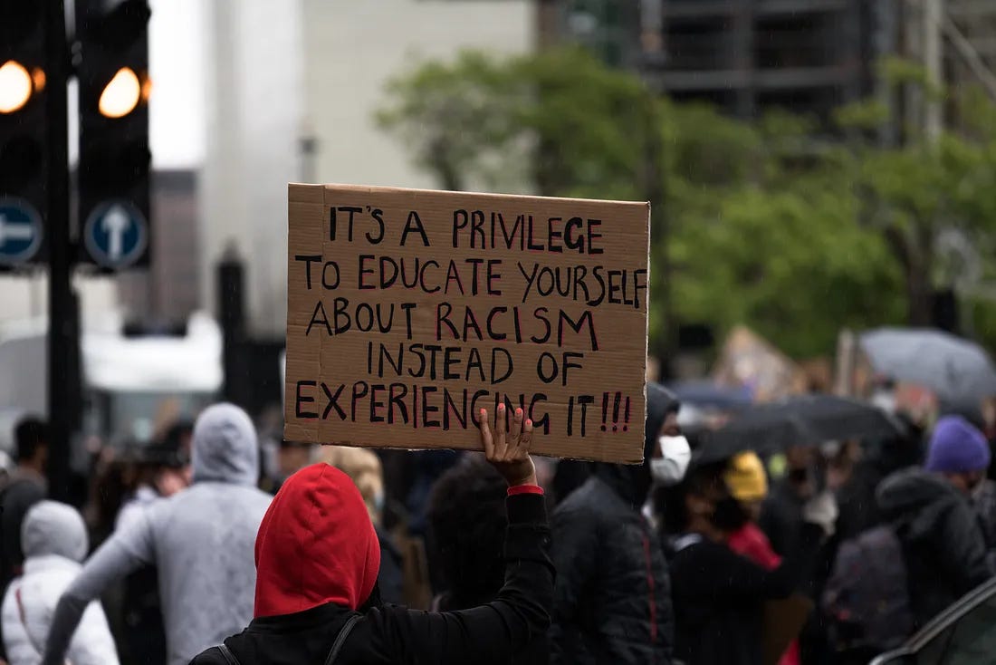 sign about racism sign about racism